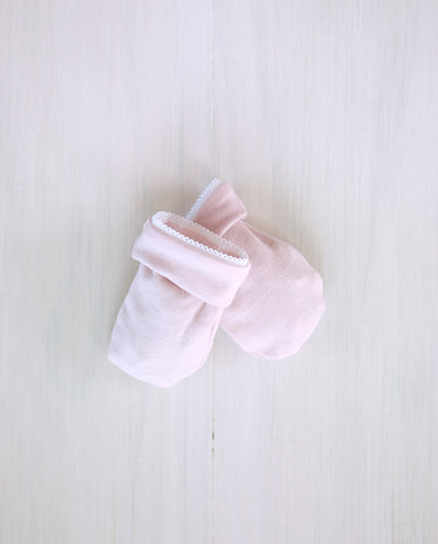 pink baby mittens made of organic merino