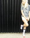 young girl wearing stripe red merino wool socks